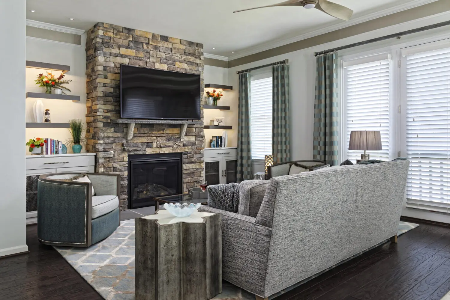 a living room with a fireplace and a couch
