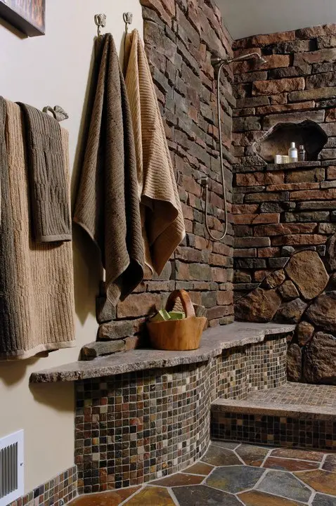 2025 Biophilic Design Insights From Top-Rated Northern Va Kitchen Designers 1 | Award Winning Interior Designers Washington Dc &Amp; Northern Virginia Areas a bathroom with stone walls and a shower