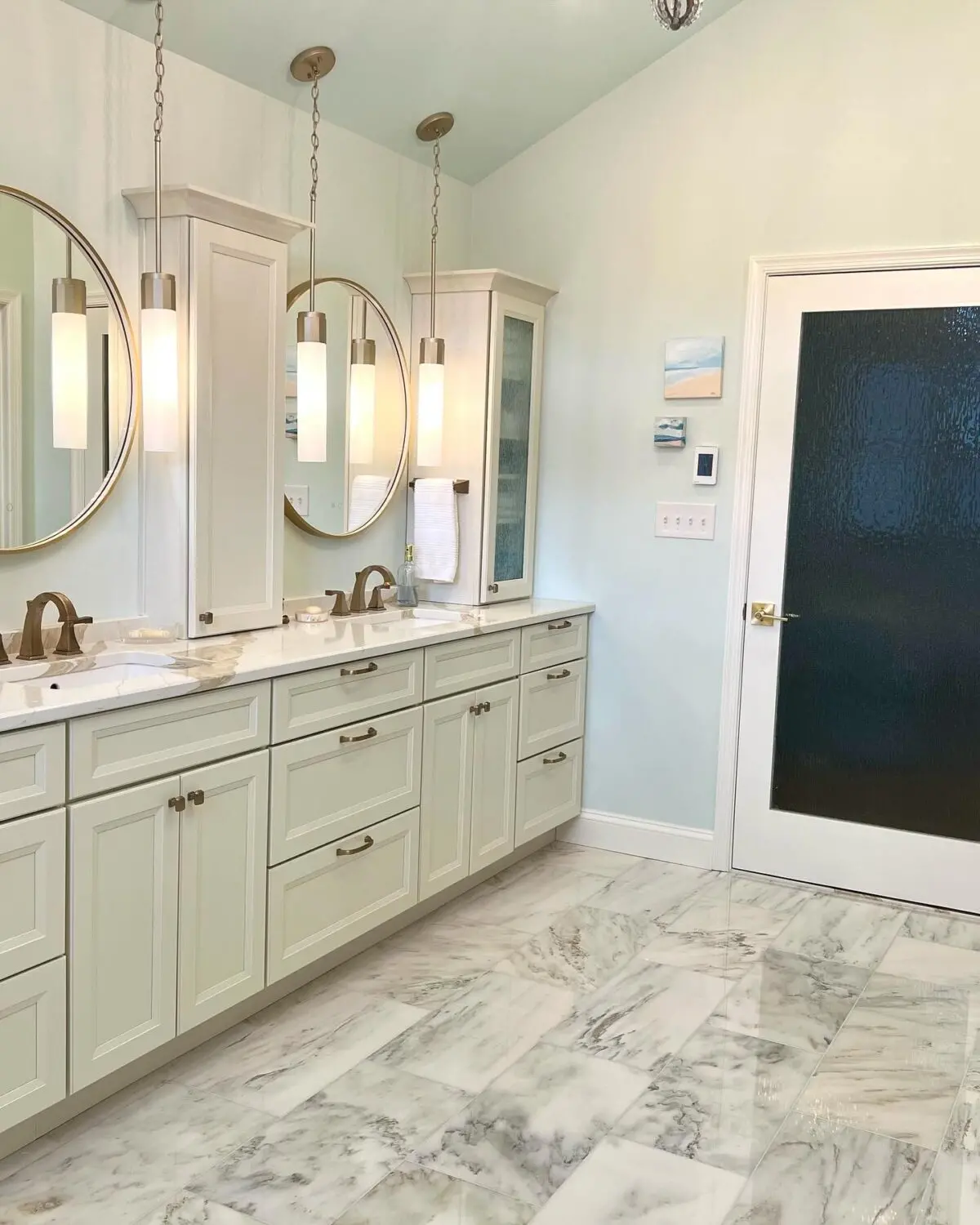 a bathroom with marble floor and marble floor