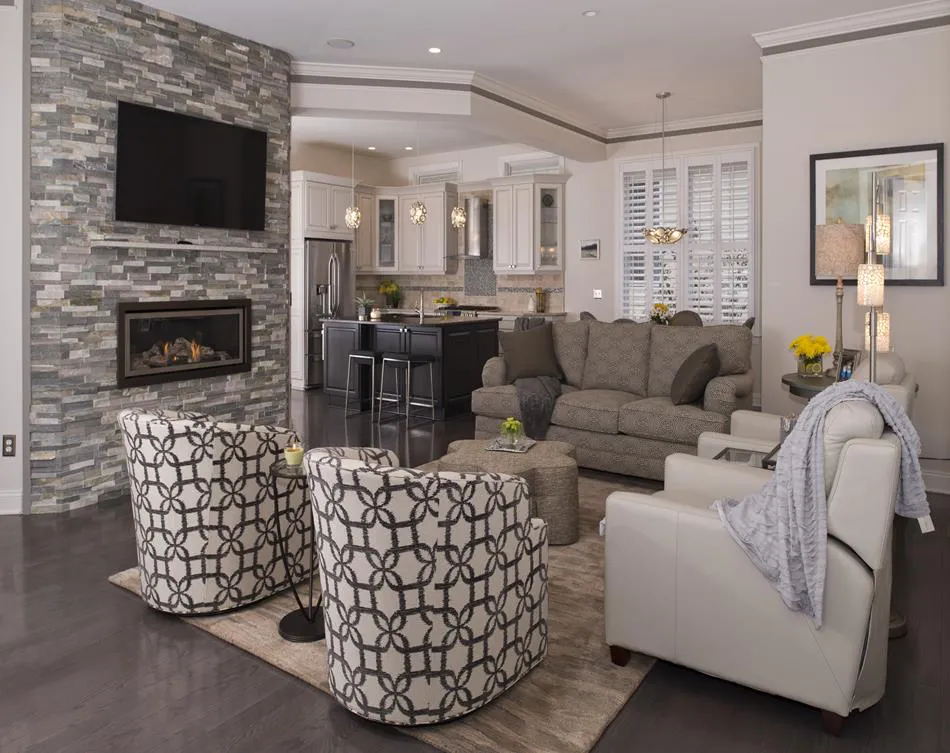a living room with a fireplace and a television