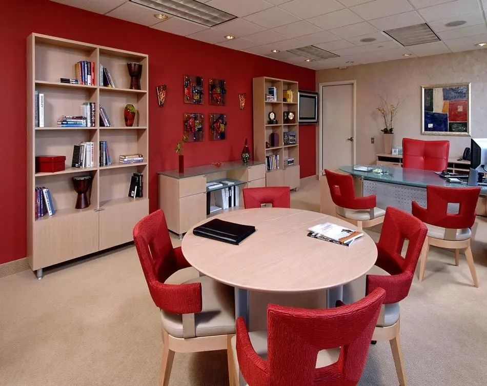 a room with a table and chairs