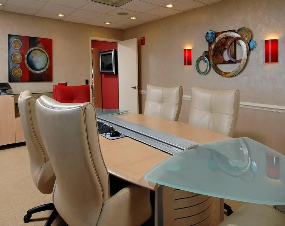 a conference room with chairs and a table