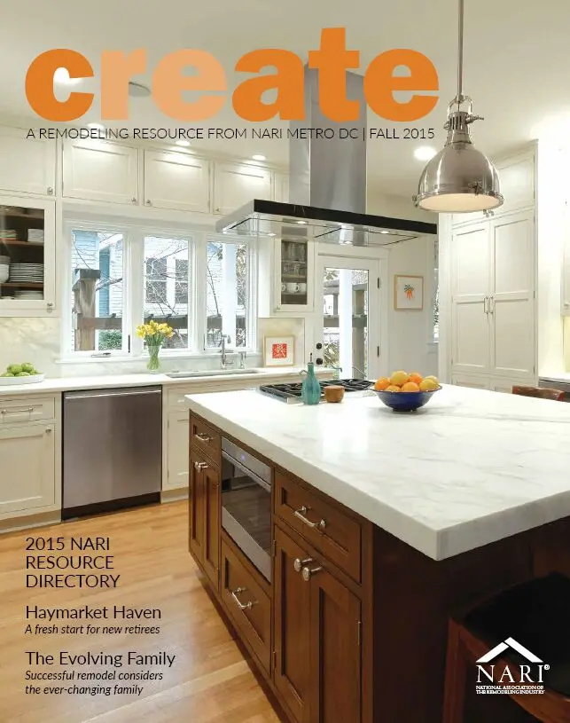 a magazine cover with a kitchen and a large island