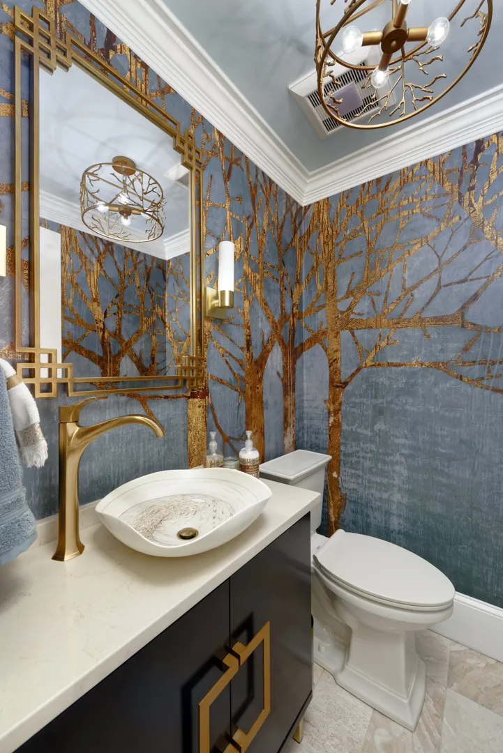 a bathroom with a mirror and a sink