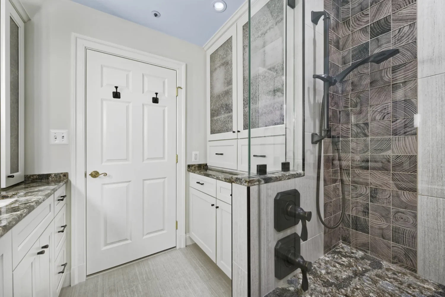 a bathroom with a glass shower