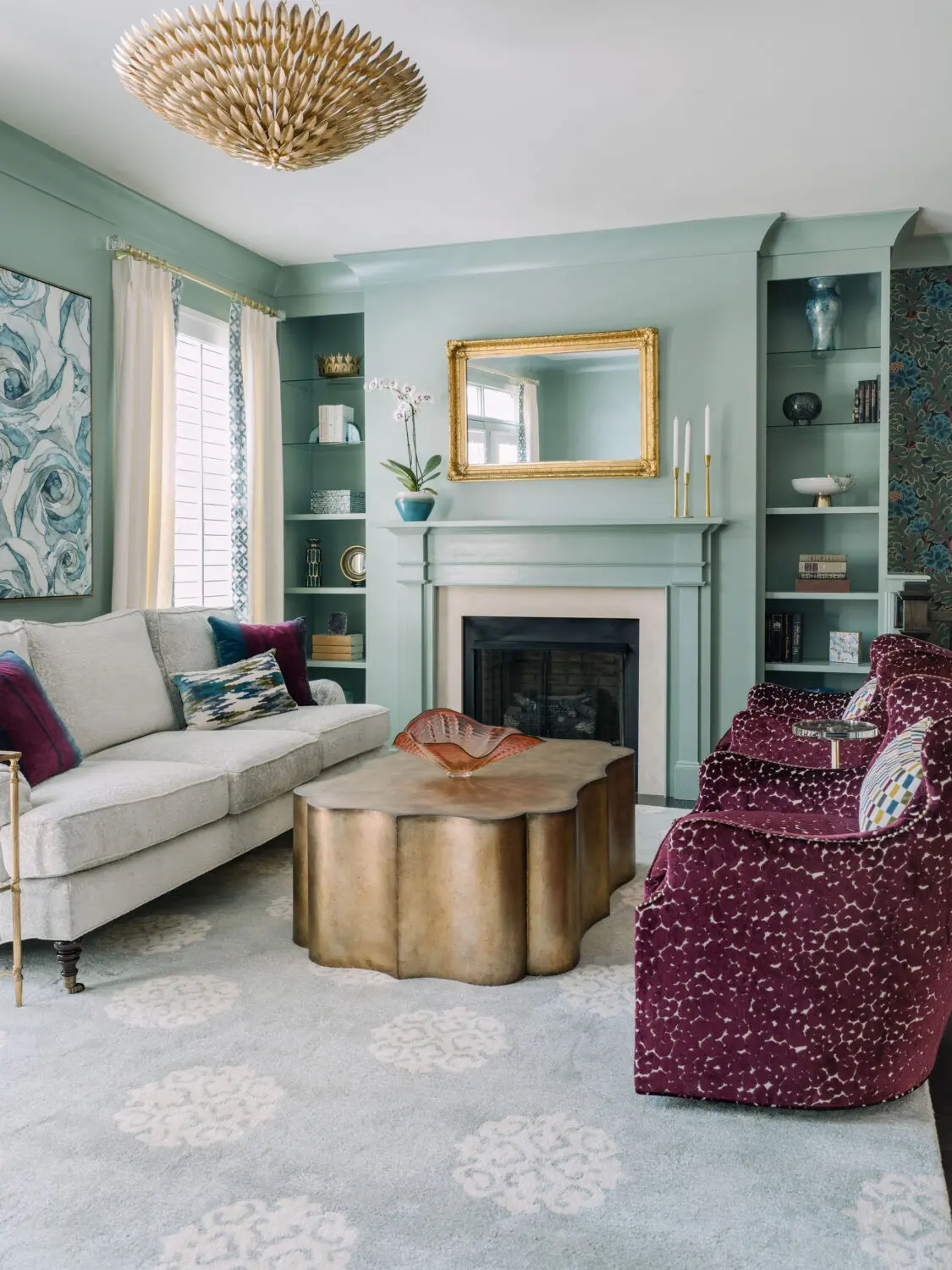 a living room with a fireplace and couches