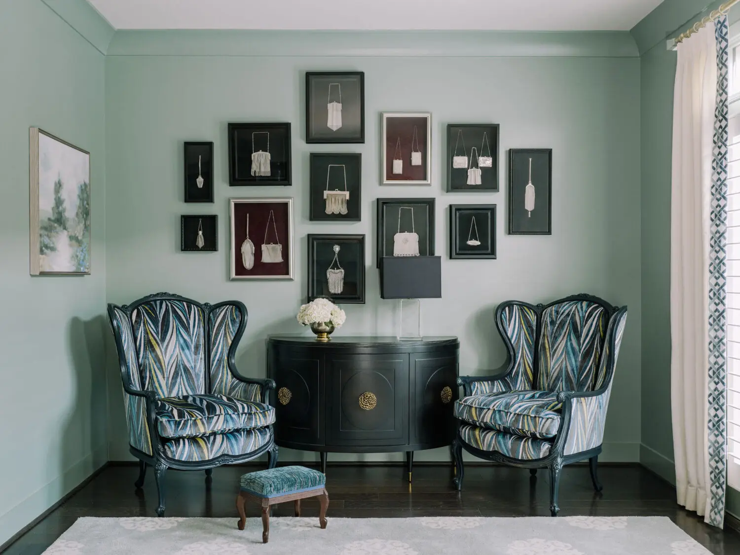 a room with chairs and a cabinet